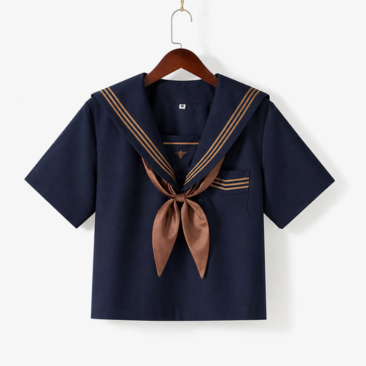 Uniforme escolar marinero con cuello ancho azul marino, tres líneas marrones y solapa cuadrada, corbata y lazo