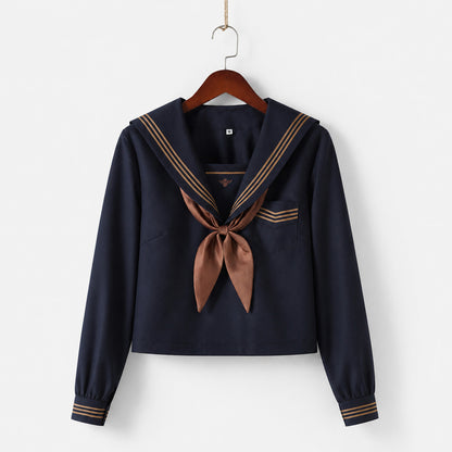 Uniforme escolar marinero con cuello ancho azul marino, tres líneas marrones y solapa cuadrada, corbata y lazo